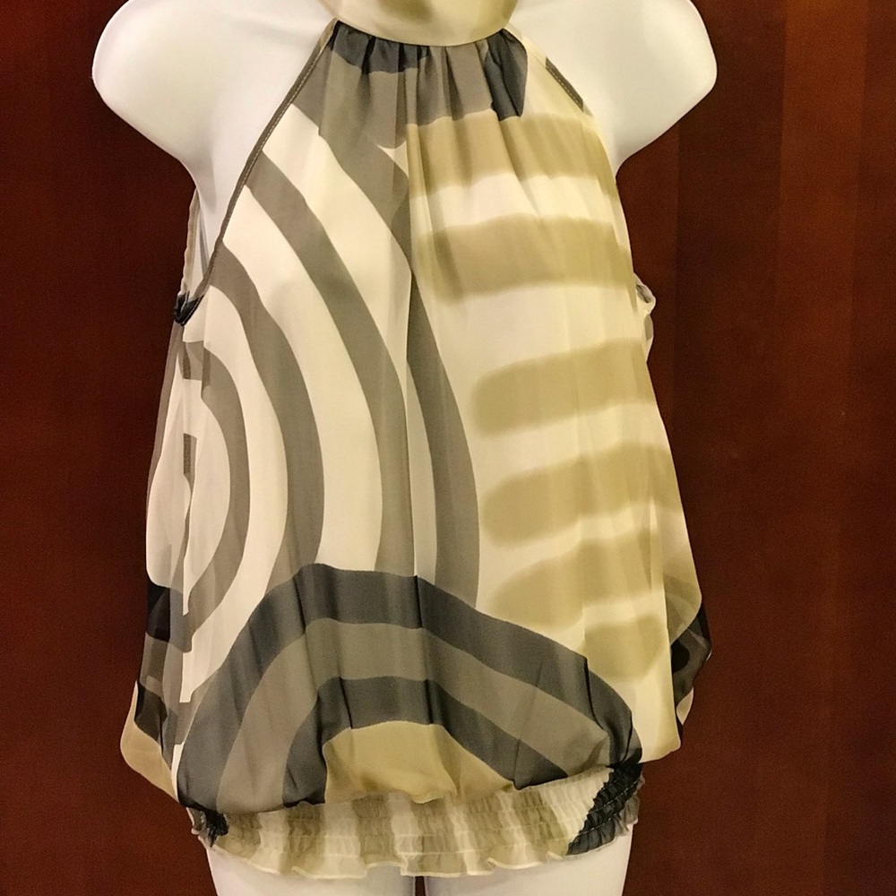 Multi-colored sleeveless blouse.